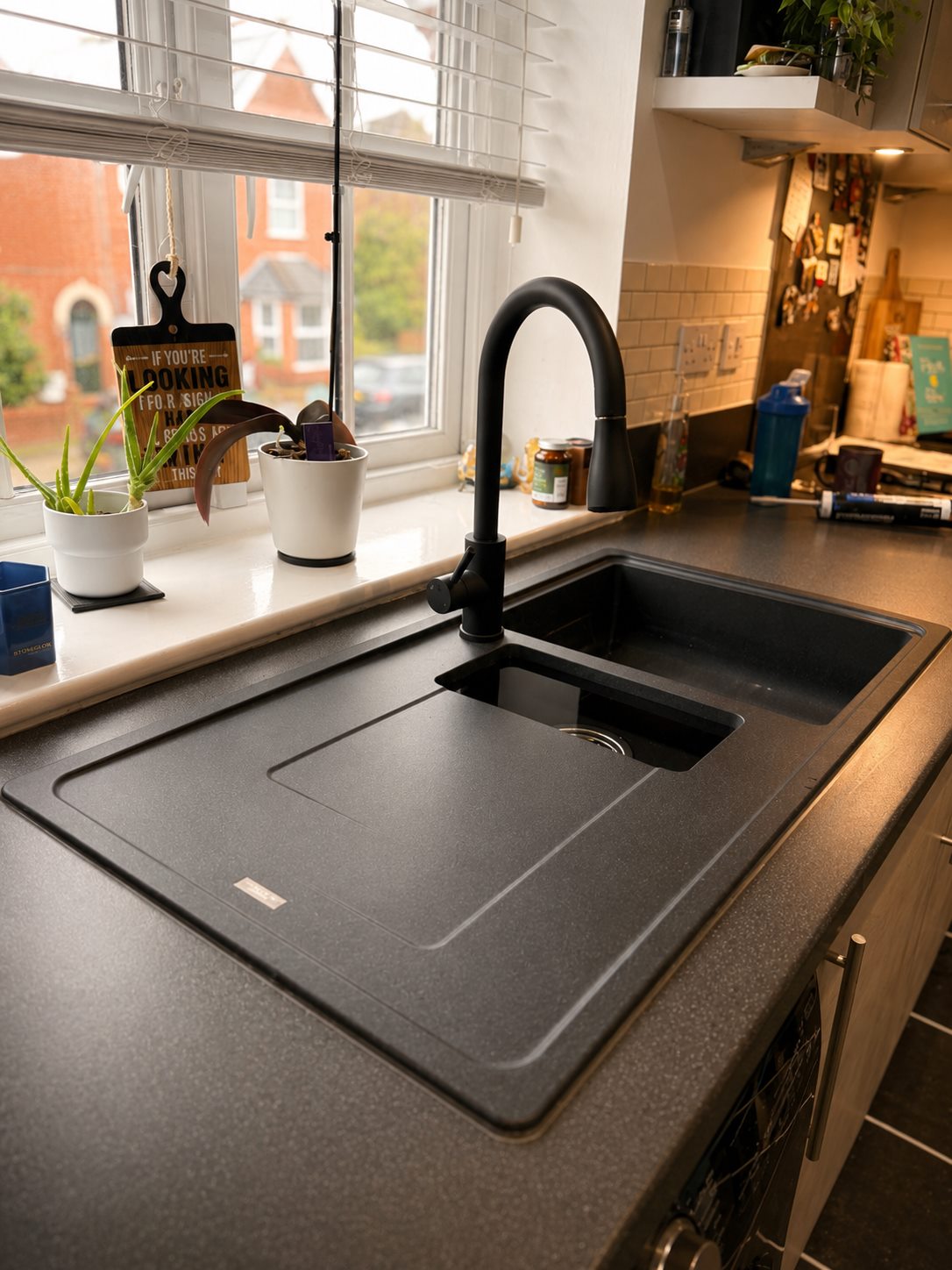 Kitchen sink and tap plumbing completed neatly