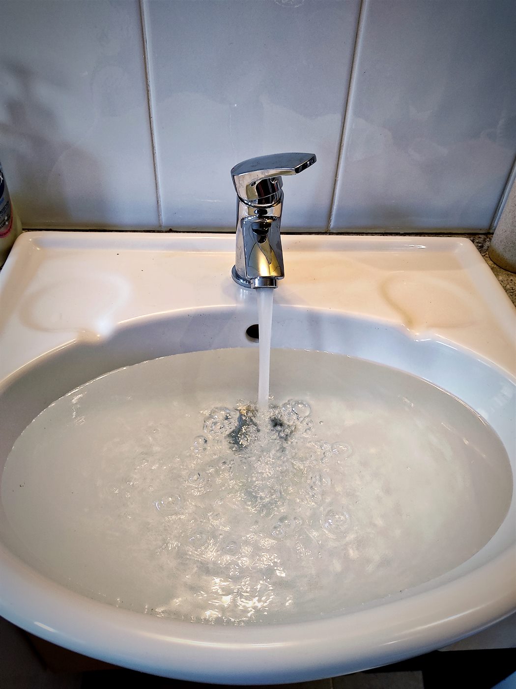 New basin tap running after replacement