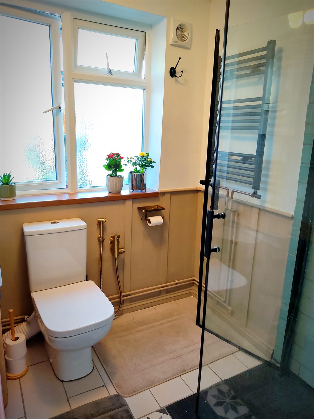 Completed toilet installation in a bathroom